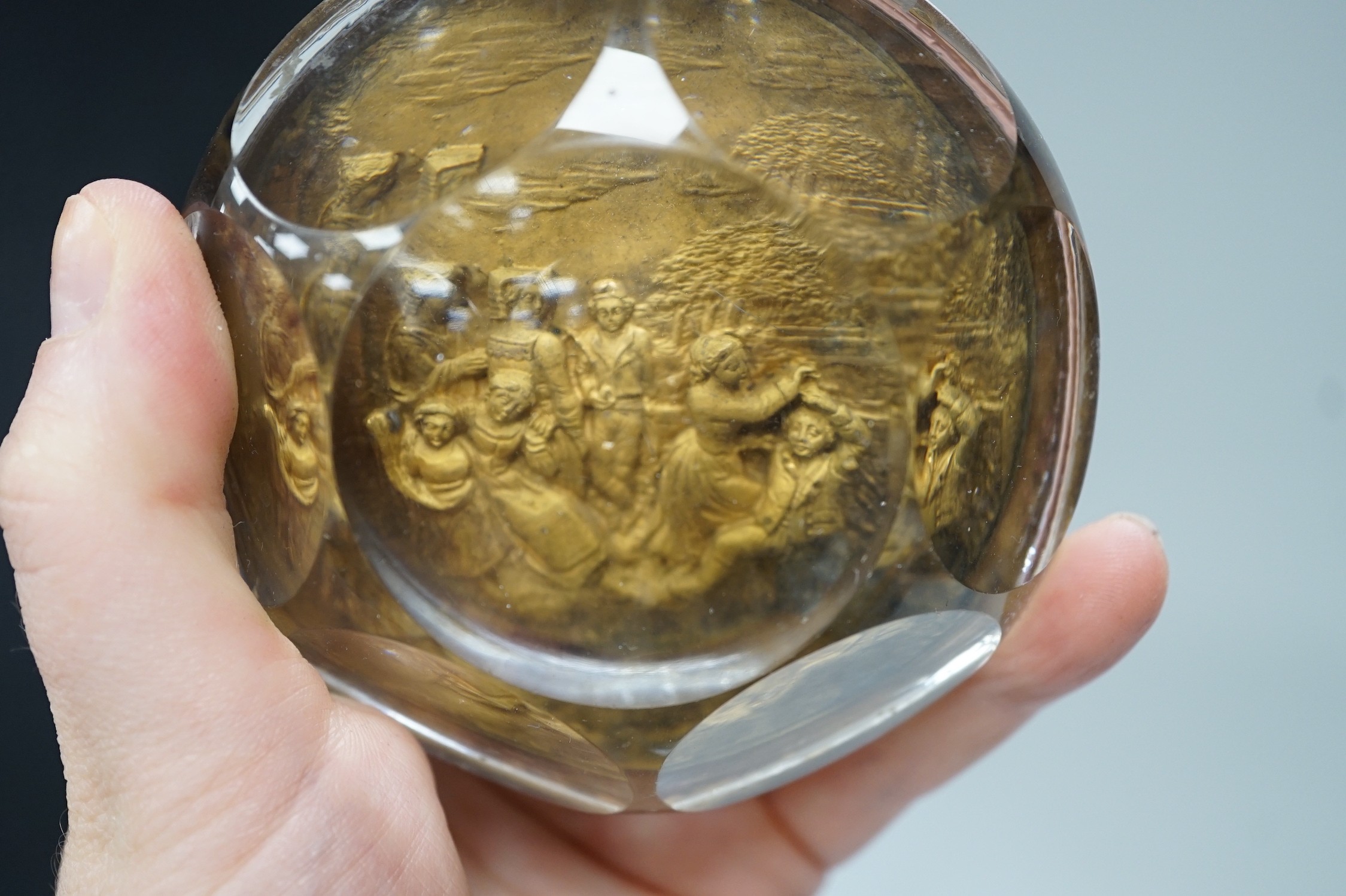 Temple Bar commemorative cast lead and brass paperweight, ‘Temple Bar: erected 1672, demolished 1878; this effigy of it was struck from the lead formally on the roof’ and a 19th century gilt metal relief glass cased pape